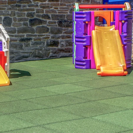 WARCO fall protection mats on a playground for small children.