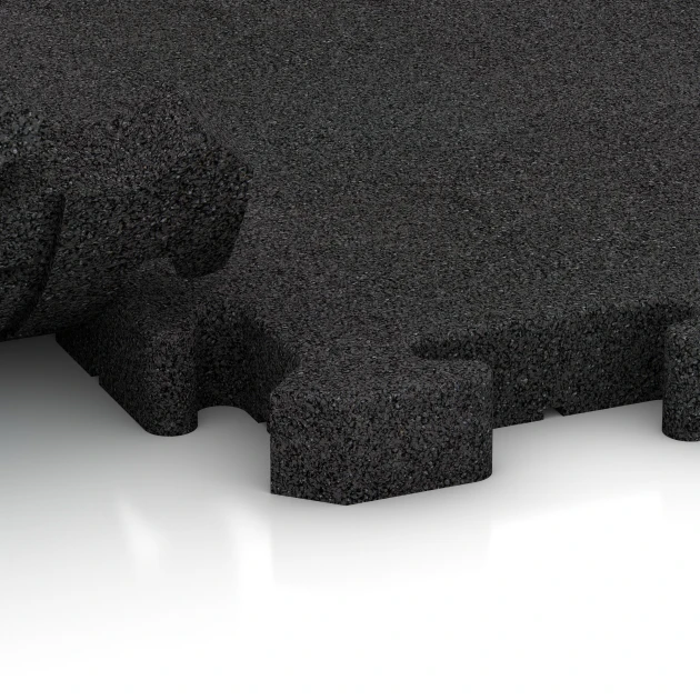 Großaufnahme vom Verbindungssystem von WARCO-Boden 2960 - Puzzle dlaždice na dětské hřiště im Farbdesign Antracit. Abmessungen 50 x 50 x 4 cm | 0,25 m².