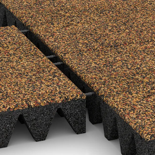 Großaufnahme vom Verbindungssystem von WARCO-Boden 5647 - Bezpečnostní dlaždice na dětské hřiště 10 cm - EN 1177 ≤ 300 cm im Farbdesign Terra Cotta. Abmessungen 500 x 500 x 100 mm.