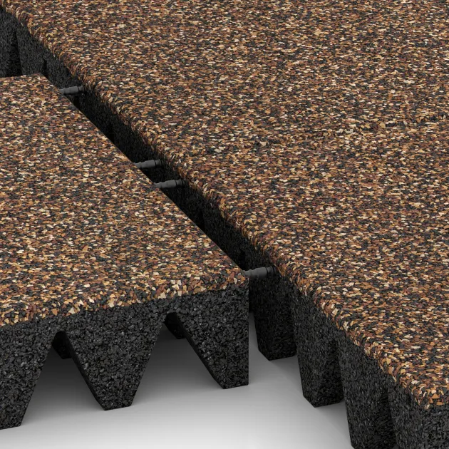 Großaufnahme vom Verbindungssystem von WARCO-Boden 5648 - Bezpečnostní dlaždice na dětské hřiště 10 cm - EN 1177 ≤ 300 cm im Farbdesign Kůra a Basto. Abmessungen 500 x 500 x 100 mm.
