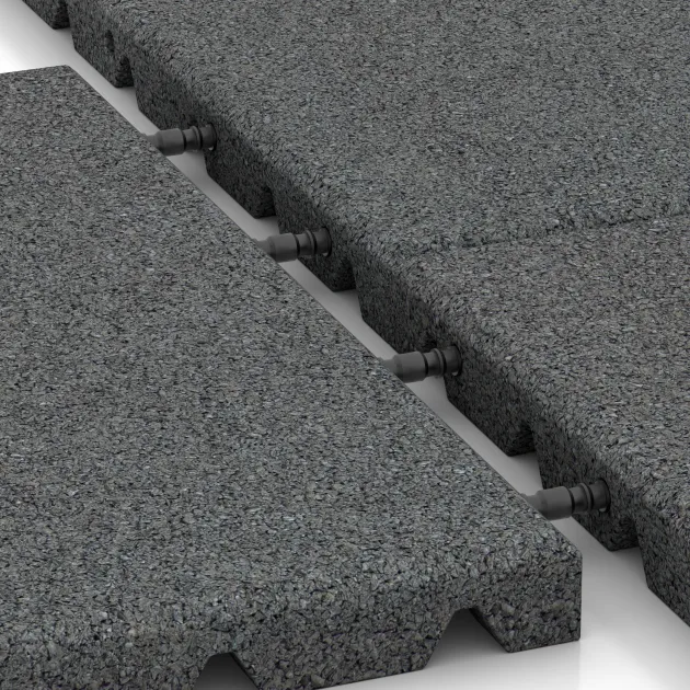 Großaufnahme vom Verbindungssystem von WARCO-Boden 0523 - Gumová dopadová dlaždice na dětské hřiště im Farbdesign Šedá břidlice. Abmessungen 400 x 400 x 30 mm.