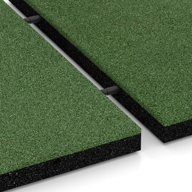 Großaufnahme vom Verbindungssystem von WARCO-Boden 6255 - Dopadová dlaždice – 140 cm im Farbdesign Travní zelená. Abmessungen 500 x 500 x 40 mm.