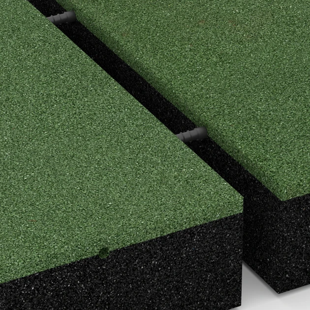 Großaufnahme vom Verbindungssystem von WARCO-Boden 6211 - Dopadové desky im Farbdesign Travní zelená. Abmessungen 50 x 50 x 11 cm.