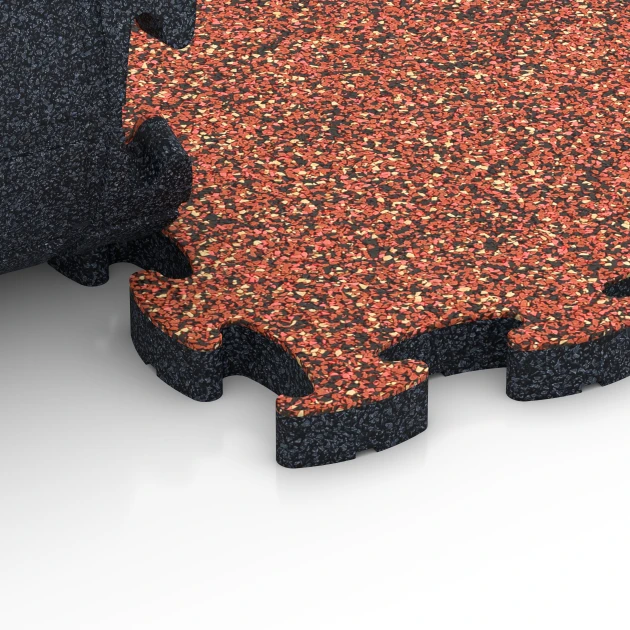 Großaufnahme vom Verbindungssystem von WARCO-Boden 6935 - Dopadová puzzle podložka im Farbdesign Etna. Abmessungen 44,6 x 44,6 × 2,8 cm.